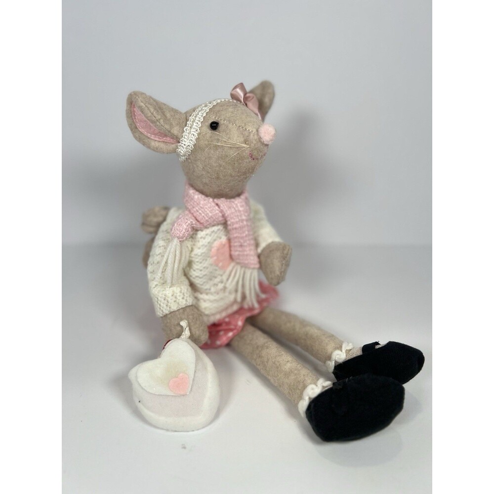 Stuffed Girl Mouse Doll Dressed With A Winter And Heart Motif. She Sits At Edge